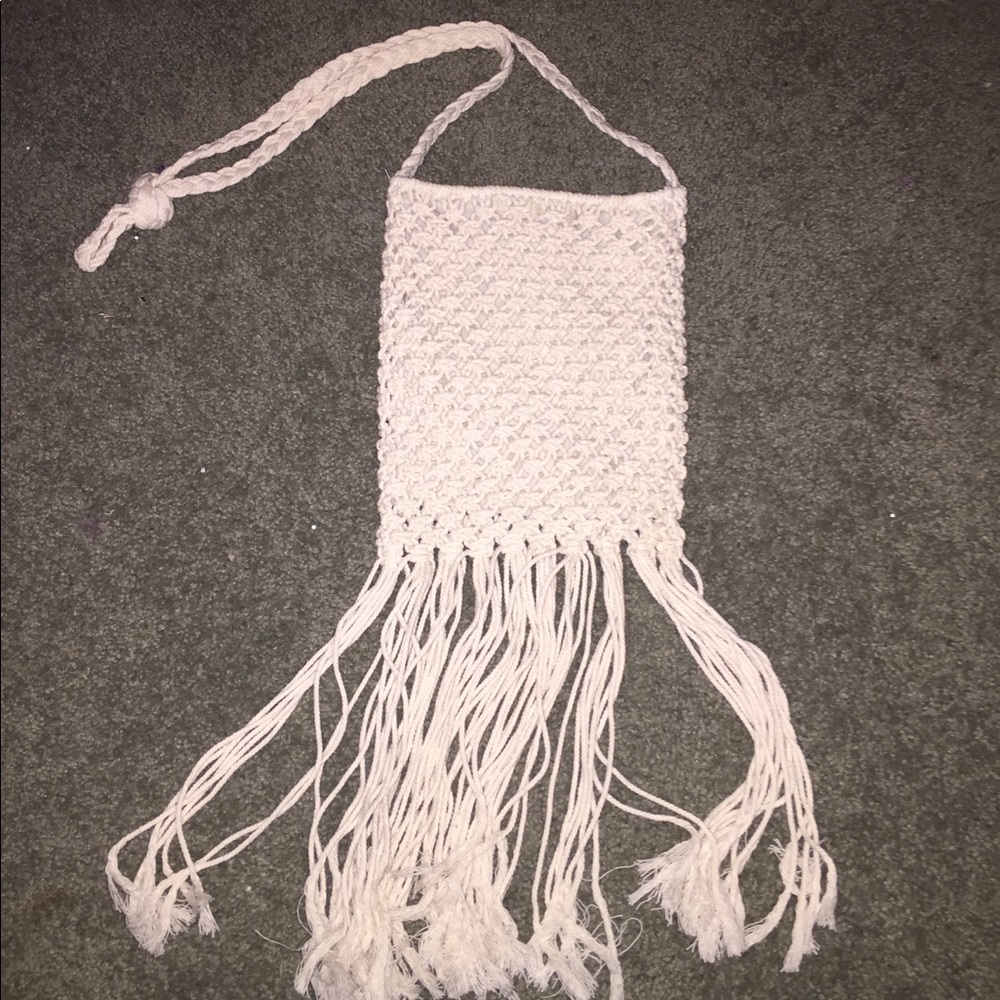 Claire’s white knit purse